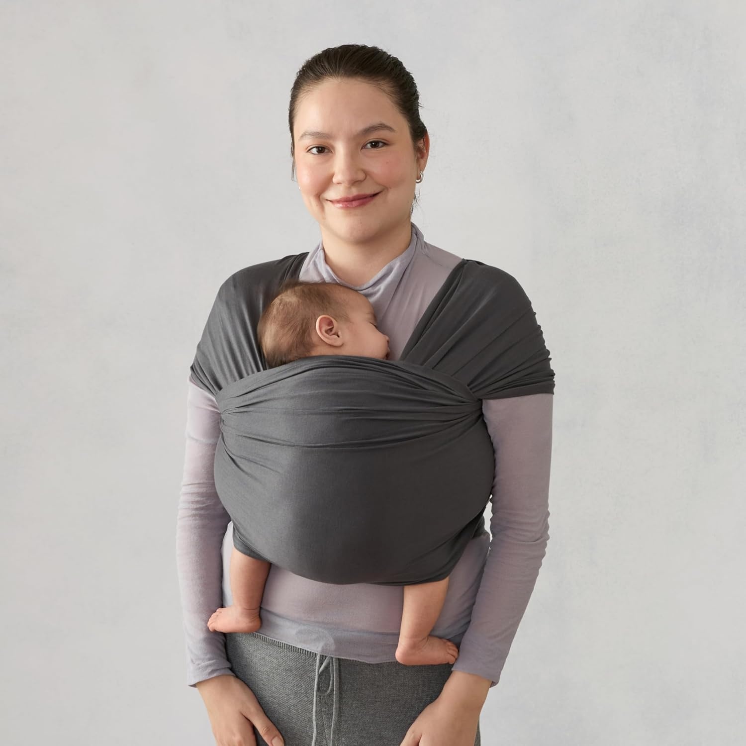 image:imageErgobaby Aura Baby Wrap Carrier for Newborn 012 Months Soft Stretchy Infant Wrap Carrier with HipHealthy Positioning PreTied Design Fits 825 lbs Twilight NavySoft Black