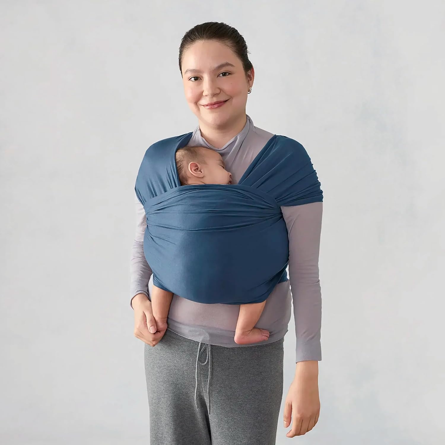 image:imageErgobaby Aura Baby Wrap Carrier for Newborn 012 Months Soft Stretchy Infant Wrap Carrier with HipHealthy Positioning PreTied Design Fits 825 lbs Twilight NavyTwilight Navy
