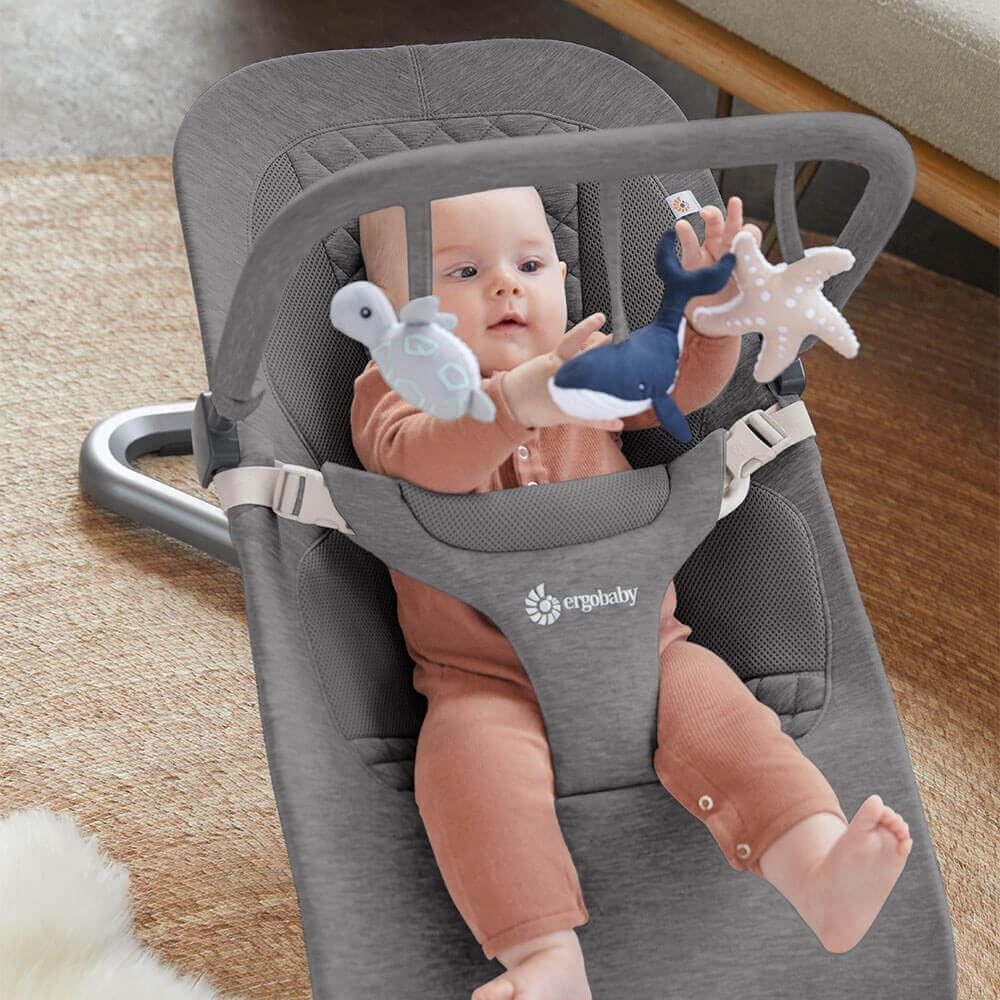 image:imageErgobaby Evolve 3in1 Bouncer Seat for Babies and Toddlers 5525 lbs Multi Position Baby Rocker Seat with Adjustable Heights Secure Harness Newborn Insert Mesh CreamOcean Wonders Charcoal Grey